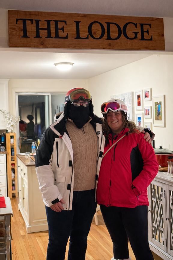 Two people dressed in Ski Après outfits