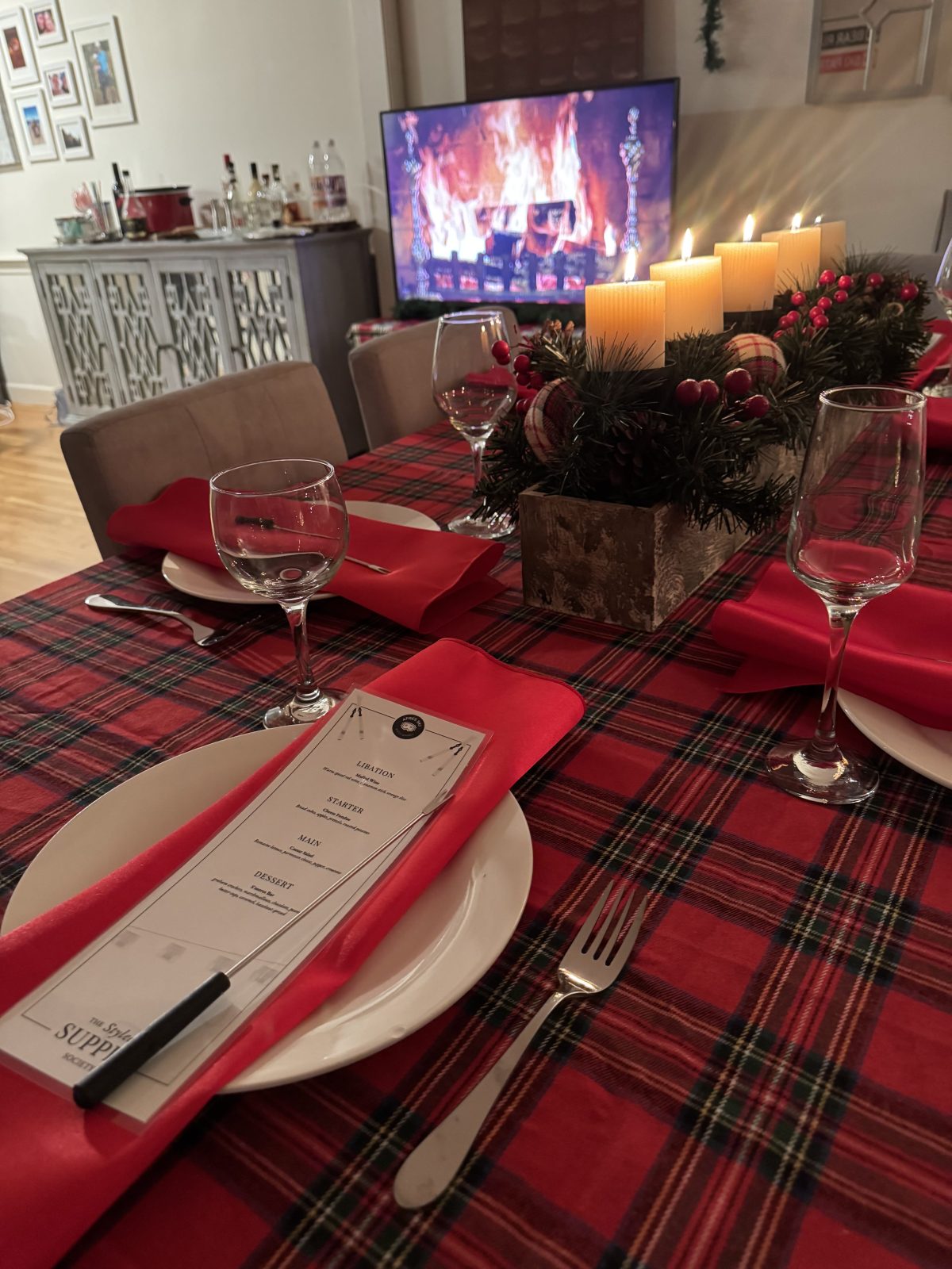 Menu sitting on plaid tablecloth for Ski Après dinner themed party