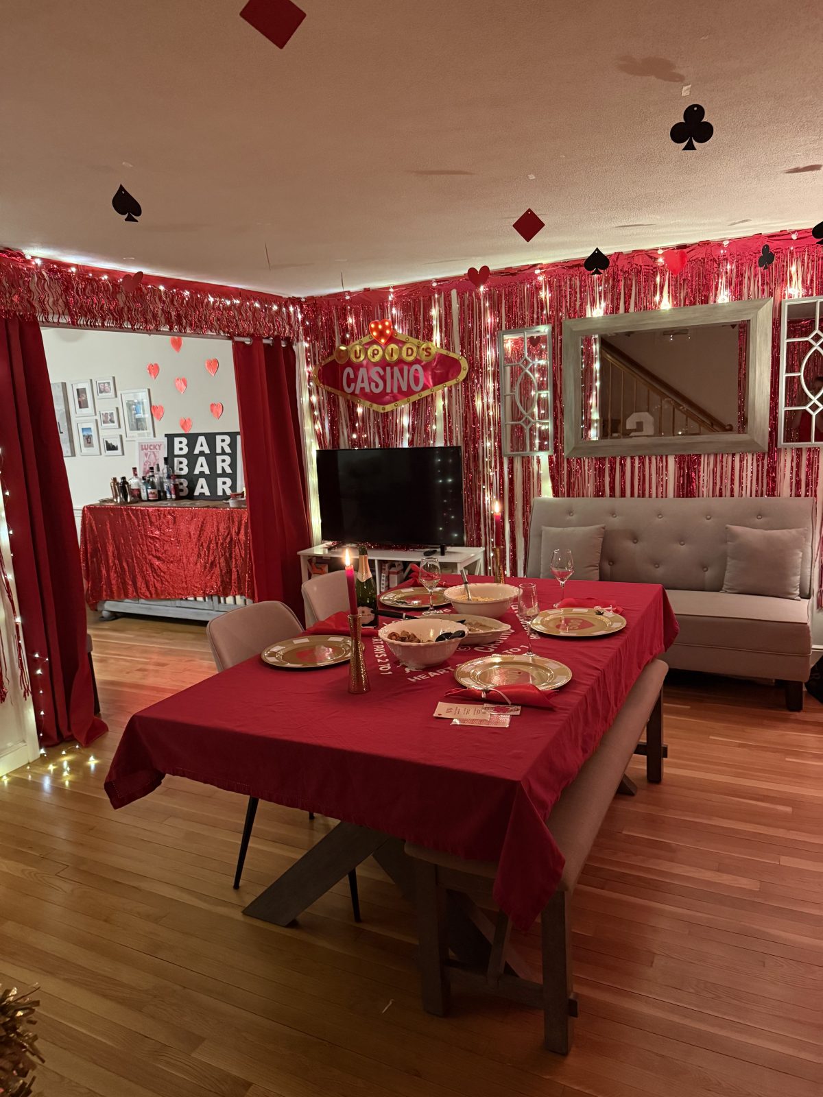 Casino Themed Dinner Party with red and gold decor